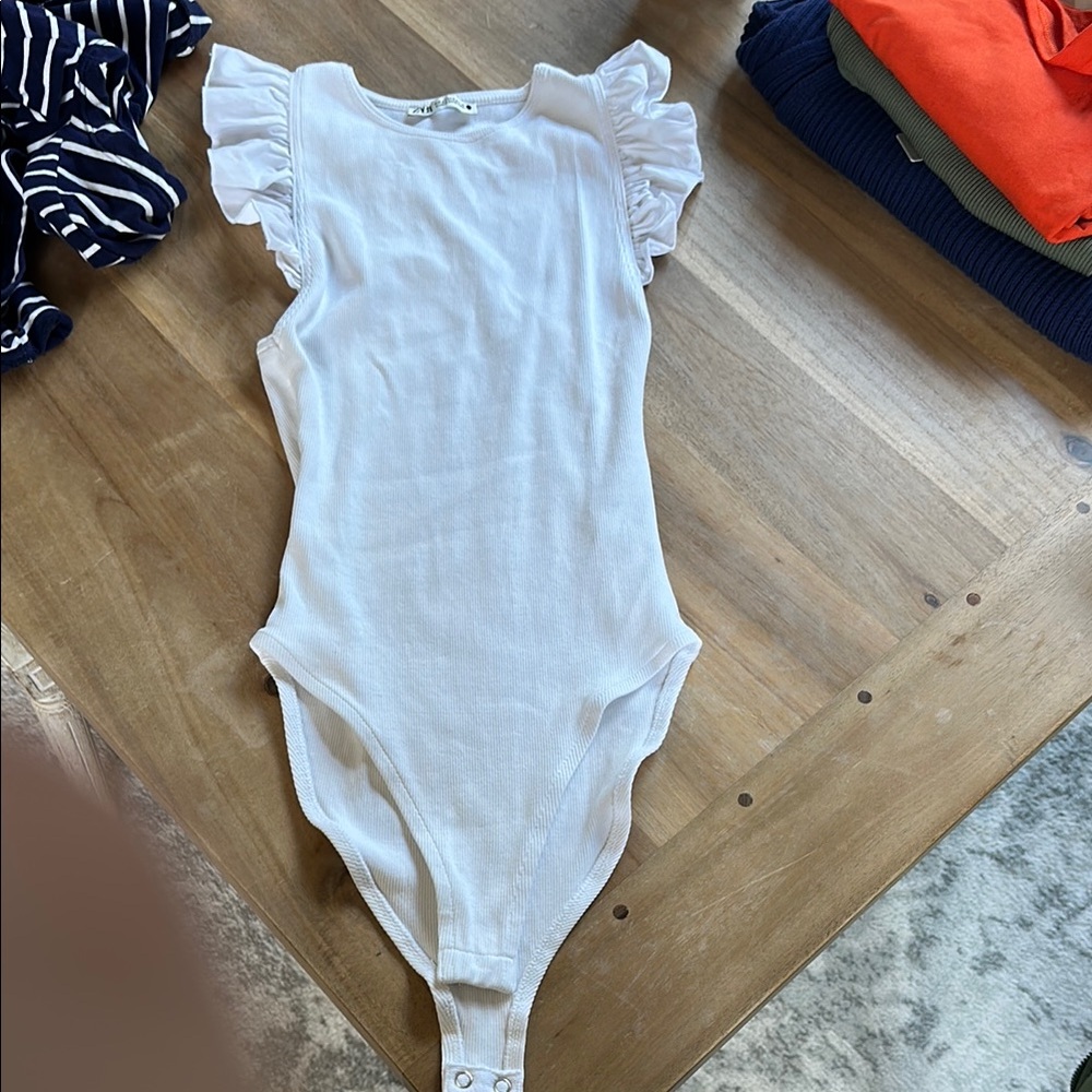 White Ruffled bodysuit
